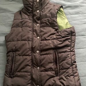 This brown no sleeve puffer jacket.